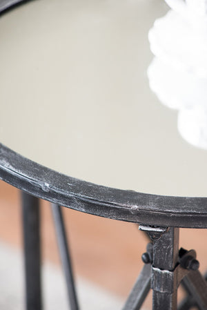 English Elm D17x26.5" Gilbert Side Table - Distressed Black Round Glass Top with Intersecting Frame & Casters W2078P394038