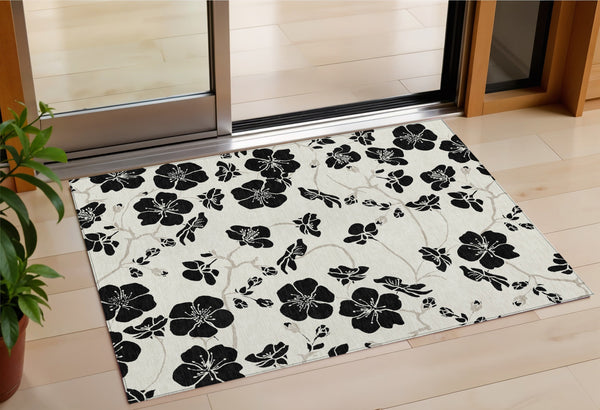 Homeroots 3' Black And Gold Floral Washable Area Rug For Indoor And Outdoor Use – Durable And Stylish Design 3' X 5' Polyester 600006