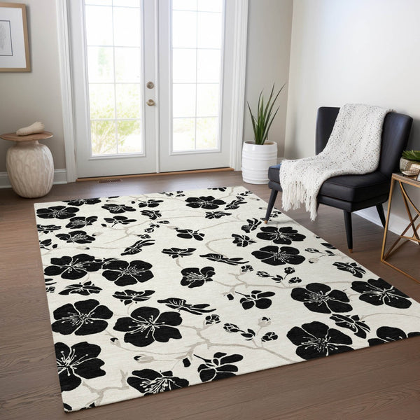 Homeroots 3' Black And Gold Floral Washable Area Rug For Indoor And Outdoor Use – Durable And Stylish Design 8' X 10' Polyester 600009