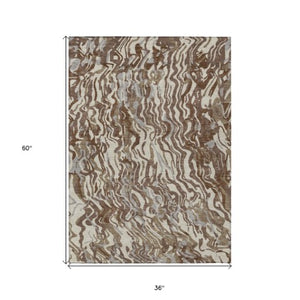Homeroots 3' Beige Brown And Ivory Abstract Washable Area Rug For Indoor Or Outdoor Comfort And Style 3' X 5' Polyester 600276