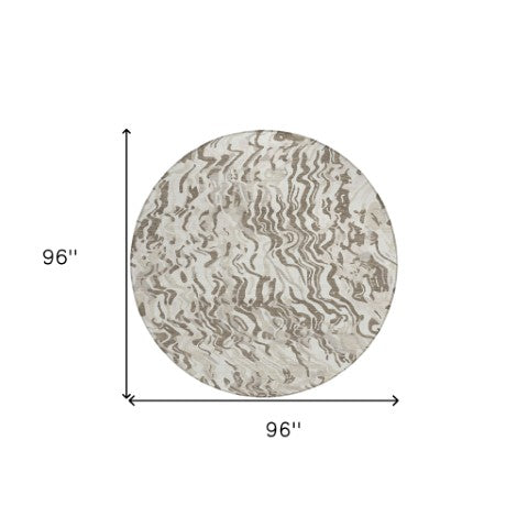 Homeroots 3' Beige Brown And Ivory Abstract Washable Area Rug For Indoor Or Outdoor Comfort And Style 8' Round Polyester 600302