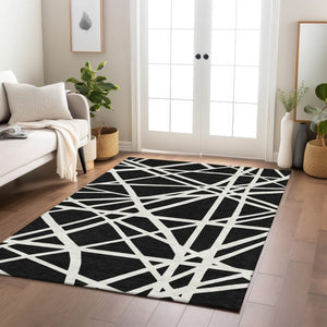 HomeRoots 5' Black and Ivory Geometric Area Rug - Stylish, Washable, Durable Design for Indoor and Outdoor Use 5' X 8' 600421