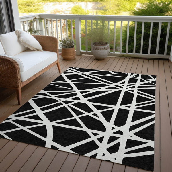 HomeRoots 9' X 12' Black and Ivory Geometric Rug - Stylish, Washable, Durable for Indoor & Outdoor Spaces 600424