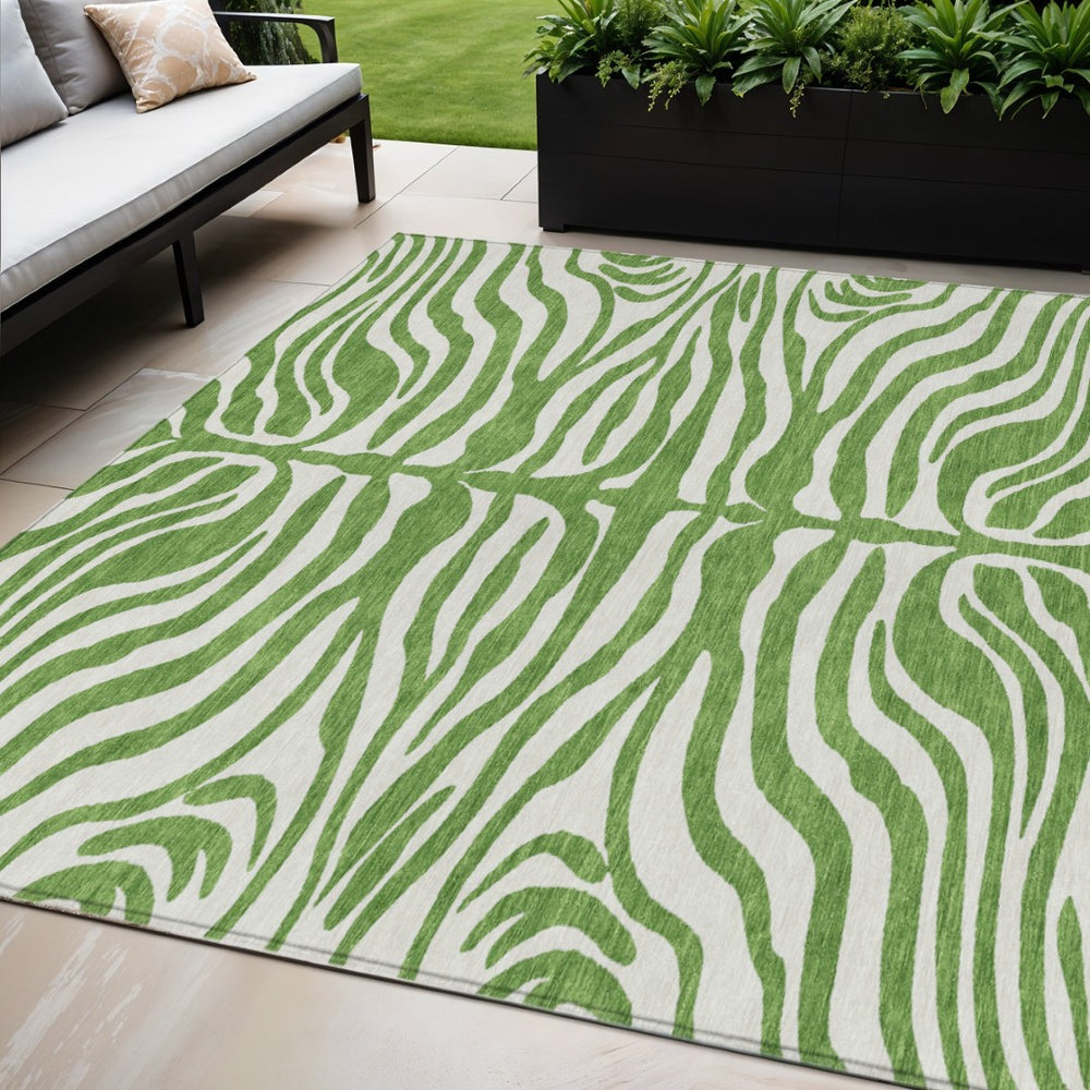 HomeRoots 5' Stylish Green and Ivory Animal Print Area Rug - Washable, Durable for Indoor & Outdoor Use 5' X 8' 600607