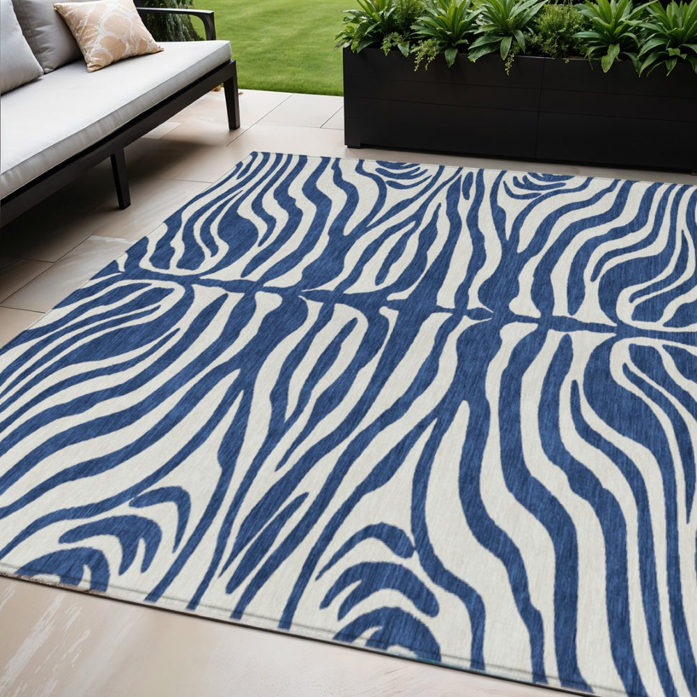 HomeRoots 5' Navy Blue and Ivory Animal Print Area Rug - Stylish, Durable, Washable for Indoor and Outdoor Use 5' X 8' 600631