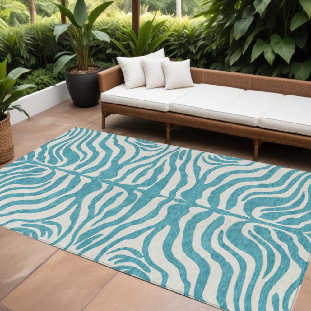 HomeRoots 9' X 12' Teal Blue & Ivory Animal Print Rug - Stylish, Washable, Indoor/Outdoor Durability for Any Space 600664
