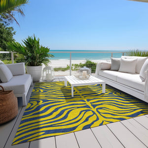 Homeroots 3' Animal Print Indoor Outdoor Area Rug - Stylish Brown And Pink Design, Washable & Durable Comfort 5' X 8' Polyester 600715