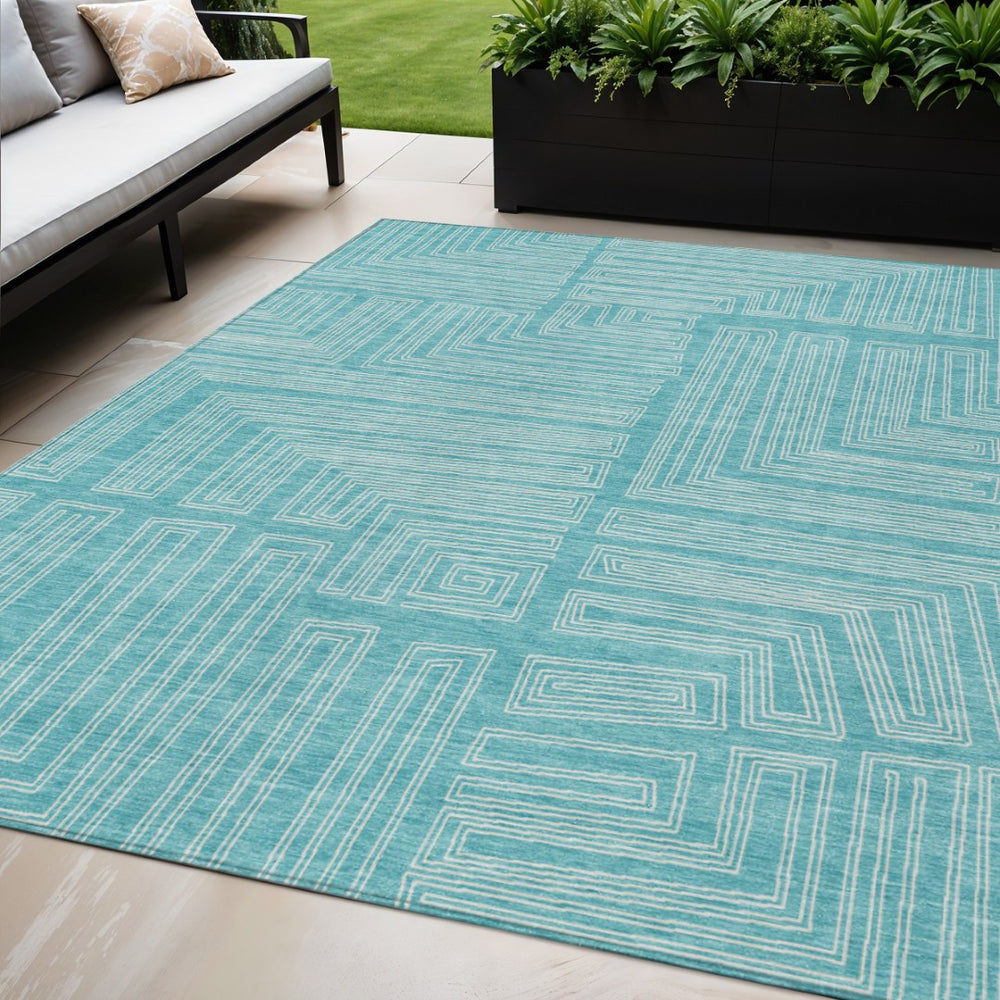 HomeRoots 5' Refresh Your Space with a Stylish Turquoise and Ivory Geometric Washable Area Rug for Indoors Outdoors 5' X 8' 600865