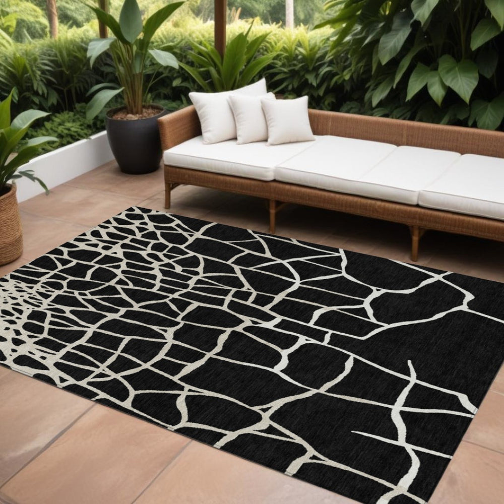HomeRoots 9' X 12' Black And Beige Abstract Area Rug - Stylish, Washable, Durable for Indoor & Outdoor Use 601108