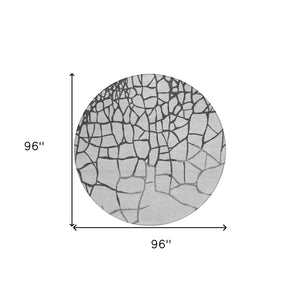 Homeroots 3' Beige And Tan Abstract Washable Area Rug For Indoor And Outdoor Spaces, Stain Resistant Design 8' Round Polyester 601130