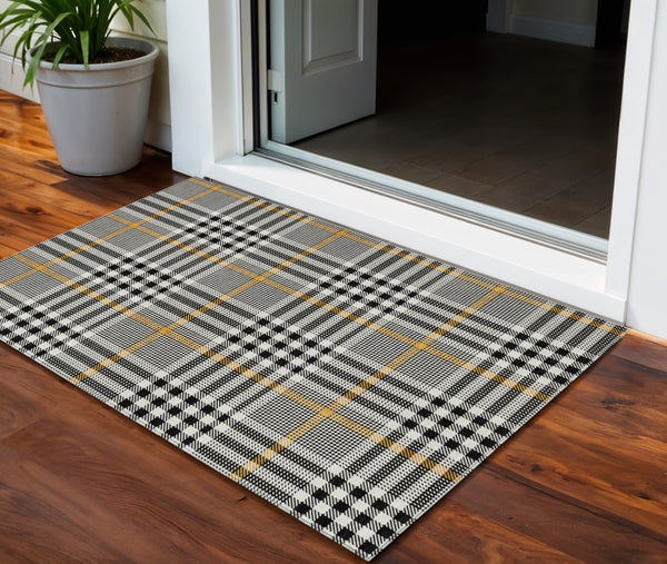Homeroots 3' Stylish Black Gold & Ivory Plaid Washable Rug - Perfect For Indoor & Outdoor High Traffic Areas 3' X 5' Polyester 601452