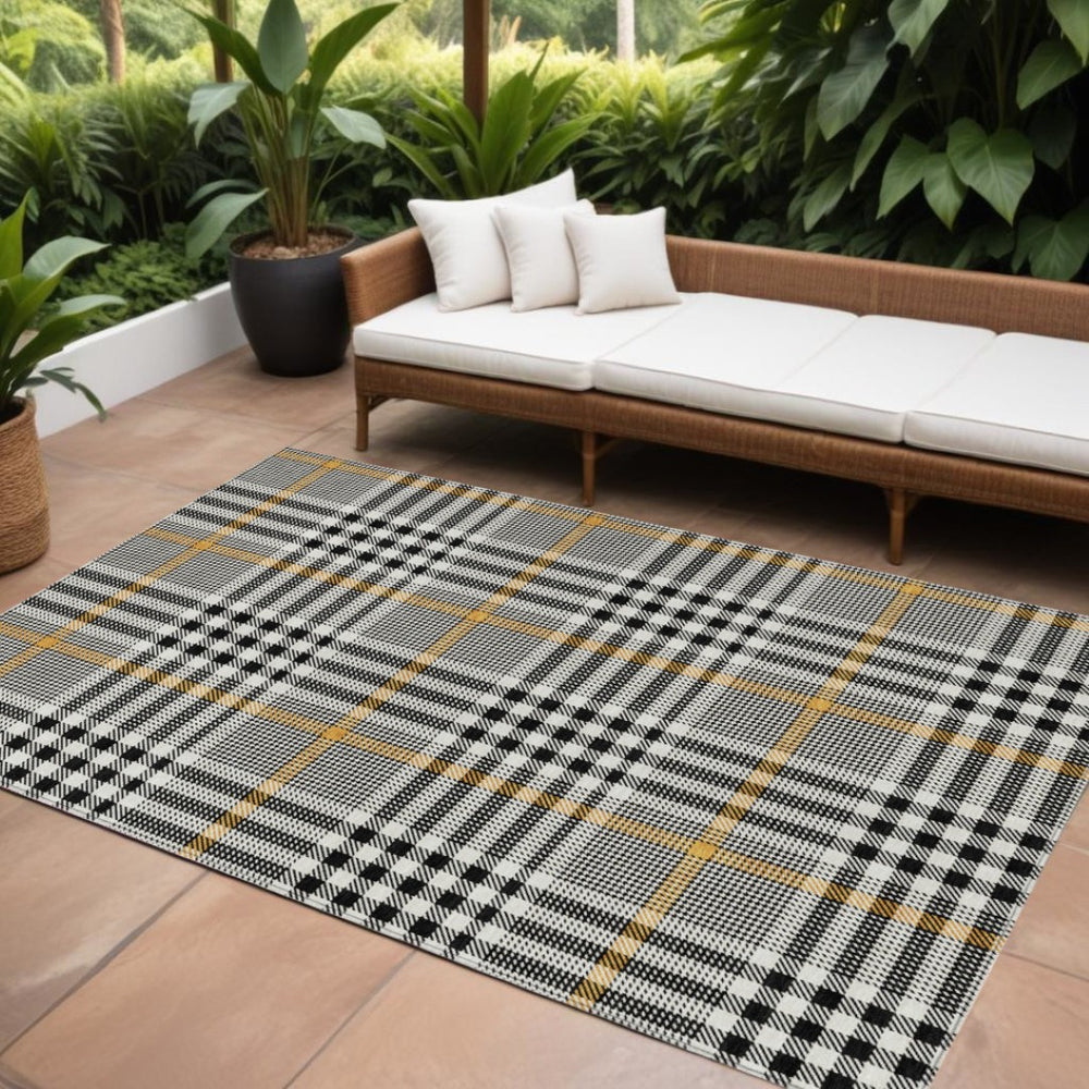 HomeRoots 9' X 12' Washable Black, Gold & Ivory Plaid Area Rug for Indoor/Outdoor High-Traffic Spaces 601456