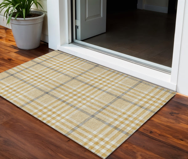 Homeroots 3' Stylish Black Gold & Ivory Plaid Washable Rug - Perfect For Indoor & Outdoor High Traffic Areas 3' X 5' Polyester 601476
