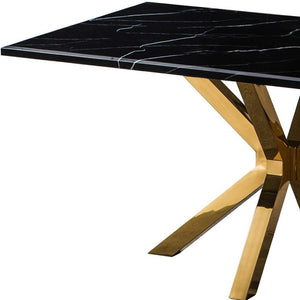 HomeRoots 63" Black and Gold Marble Dining Table with Metal Cross Legs - Stylish Centerpiece for Any Space 602325