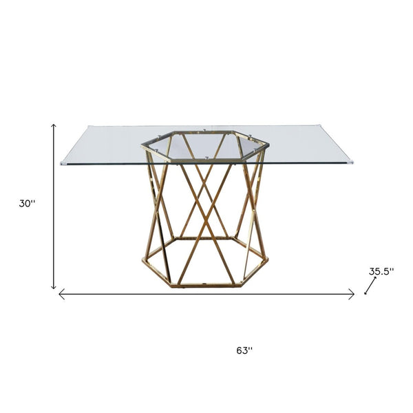 HomeRoots 63" Clear Glass and Gold Metal Geo Pedestal Dining Table - Modern Elegance for Any Space 602328