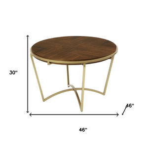 HomeRoots 46" Brown and Gold Round Trestle Dining Table - Solid Wood Top with Sturdy Metal Base for 4 People 602330