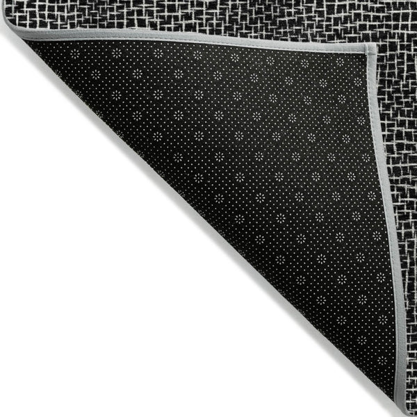 HomeRoots 5' Black and Ivory Geometric Indoor Outdoor Area Rug - Durable, Washable, Perfect for Any Space! 5' X 8' 602342
