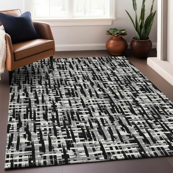 Homeroots 3' Stylish Black, Gray, And Ivory Abstract Washable Area Rug For Indoor And Outdoor Spaces 9' X 12' Polyester 602471