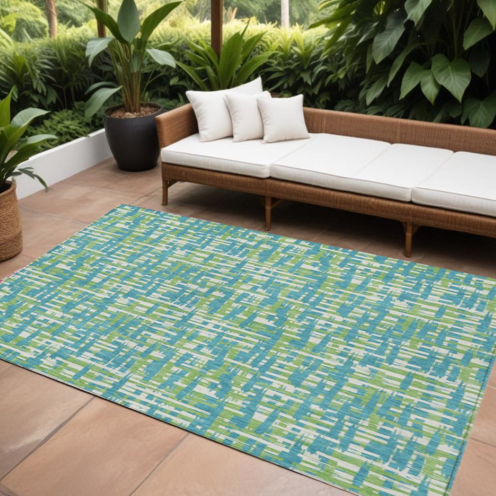HomeRoots 5' Turquoise Green and Ivory Abstract Area Rug – Stylish, Washable Design for Indoor and Outdoor Use 10' X 14' 602604
