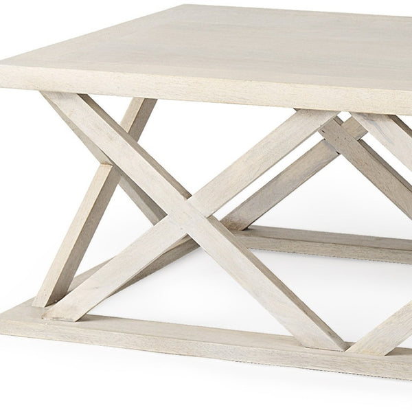 Homeroots 48" Off White Solid Wood Distressed Coffee Table With Geometric Base – Rustic Elegance For Any Room   603247