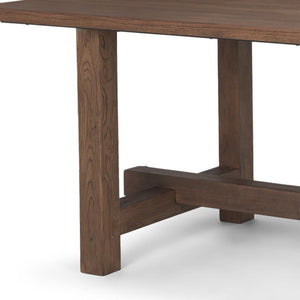 HomeRoots 84" Brown Solid Wood Trestle Base Dining Table - Timeless Elegance for Dining & Versatile Workspaces 604015