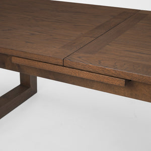 HomeRoots 106" Dark Brown Extendable Dining Table with Self-Storing Leaf and Sleek Sled Base for Versatile Use 604023
