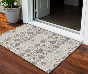 Homeroots 3' Stylish Black Brown Beige Floral Washable Area Rug For Indoor And Outdoor Spaces, Durable Design 3' X 5' Polyester 605425