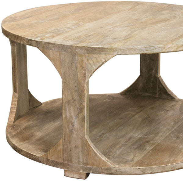 Homeroots 34" Natural Solid Wood Round Distressed Coffee Table With Shelf - Stylish & Rustic Home Accent Piece   605492