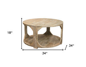 Homeroots 34" Natural Solid Wood Round Distressed Coffee Table With Shelf - Stylish & Rustic Home Accent Piece   605492
