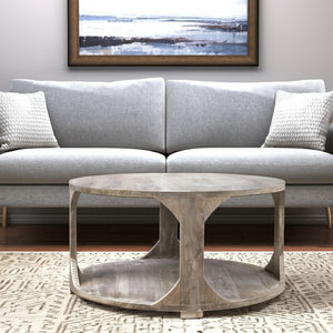 Homeroots 34" Natural Solid Wood Round Distressed Coffee Table With Shelf - Stylish & Rustic Home Accent Piece   605492