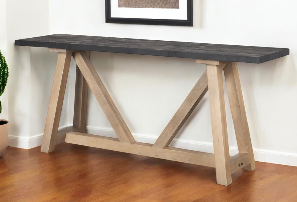 Homeroots 70" Black And Brown Solid Wood Trestle Console Table - Elegant Versatile Design For Any Space   605659