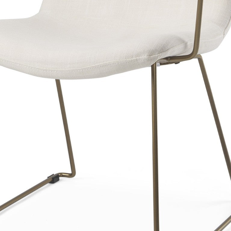 HomeRoots Beige Upholstered Arm Chair with Golden Accents for Elegant Dining Room Decor 605677