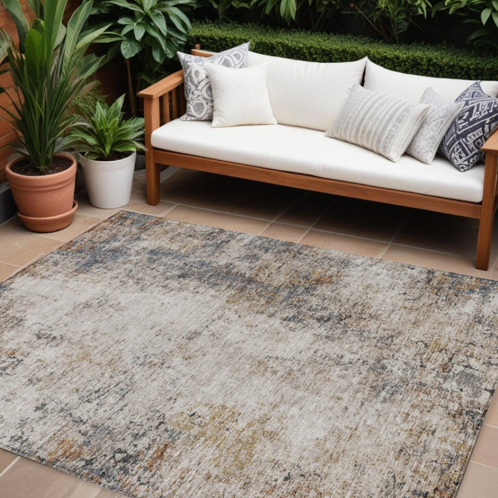 HomeRoots 9' X 12' Abstract Washable Area Rug in Ivory, Blue & Copper - Perfect for Indoor & Outdoor Spaces! 605847