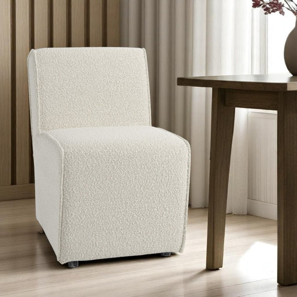 HomeRoots Cream Boucle Dining Side Chair with Wheels - Stylish, Comfortable, and Versatile for Any Space! 605880