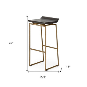 HomeRoots 30" Stylish Black and Gold Backless Bar Stool - Modern Solid Wood and Metal Design for Comfort 605912