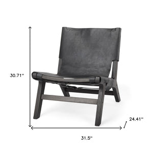 HomeRoots 32" Black Genuine Leather Slipper Chair - Modern Solid Wood Frame, Plush Comfort for Any Space 606002
