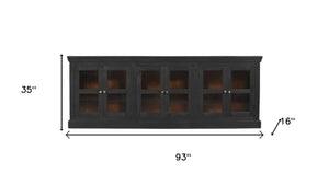 HomeRoots 93" Charcoal Distressed Solid Wood Sideboard with Glass Doors - Vintage Elegance for Every Space 606277