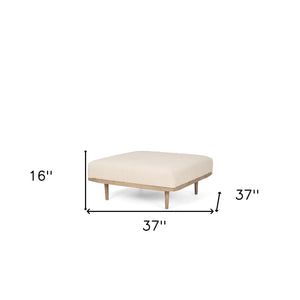 HomeRoots 37" Stylish Beige and Brown Cocktail Ottoman with Solid Mango Wood Base for Versatile Living Spaces 606719