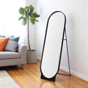 HomeRoots 67" Black Metal Oval Freestanding Mirror - Adjustable Tilt, Modern Design for Bedrooms & Living Rooms 607288