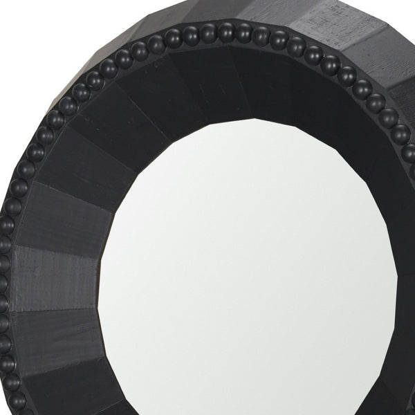 HomeRoots 30" Black Round Accent Mirror - Handcrafted Solid Mango Wood with Faceted Design & Beaded Trim 607304