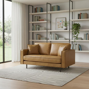 HomeRoots 65" Tan Leather Sofa with Pillow-Top Arms and Durable Brown Metal Legs for Modern Comfort 607311
