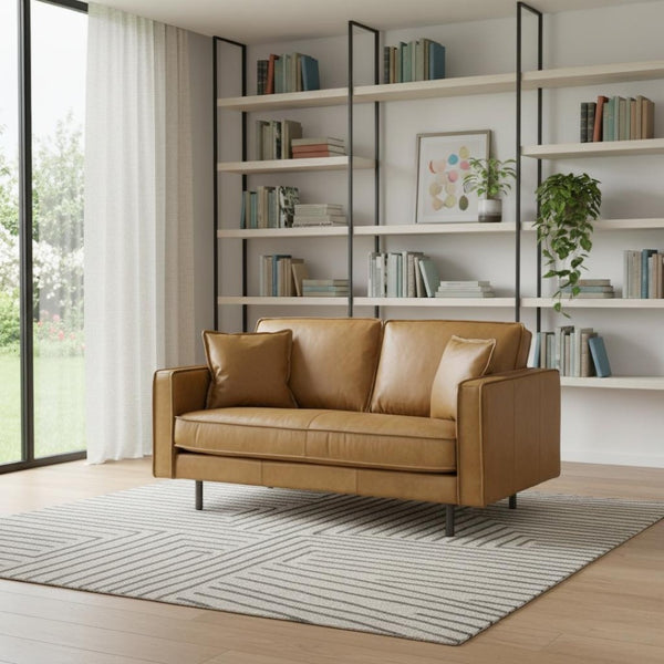 HomeRoots 65" Tan Leather Sofa with Pillow-Top Arms and Durable Brown Metal Legs for Modern Comfort 607311