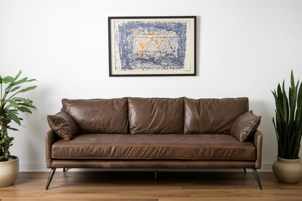 HomeRoots 82" Dark Brown Rustic Leather Sofa with Pillows - Vintage Charm, Modern Comfort for Your Living Room 607320
