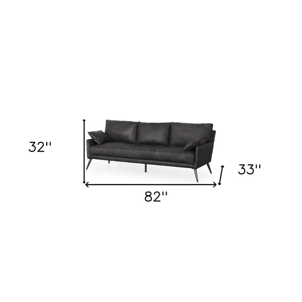 HomeRoots 82" Black Leather Sofa - Contemporary Comfort with Toss Pillows & Stylish Gray Metal Legs for Any Space 607324