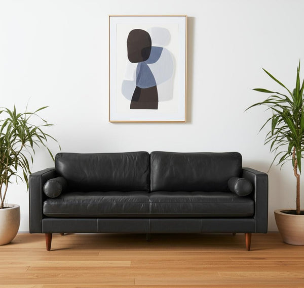 HomeRoots 88" Black Leather Sofa with Toss Pillows, Solid Wood Frame & Modern Design for Ultimate Comfort 607326