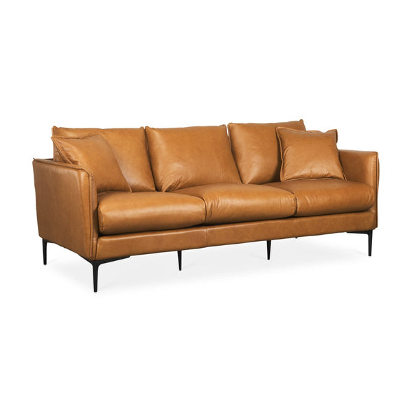 HomeRoots 86" Tan Leather Sofa with Toss Pillows, Sleek Black Metal Legs, Vintage Charm & Modern Comfort 607327