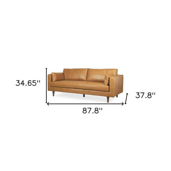 HomeRoots 88" Premium Tan Leather Sofa with Toss Pillows & Elegant Brown Legs for Modern Living Spaces 607329