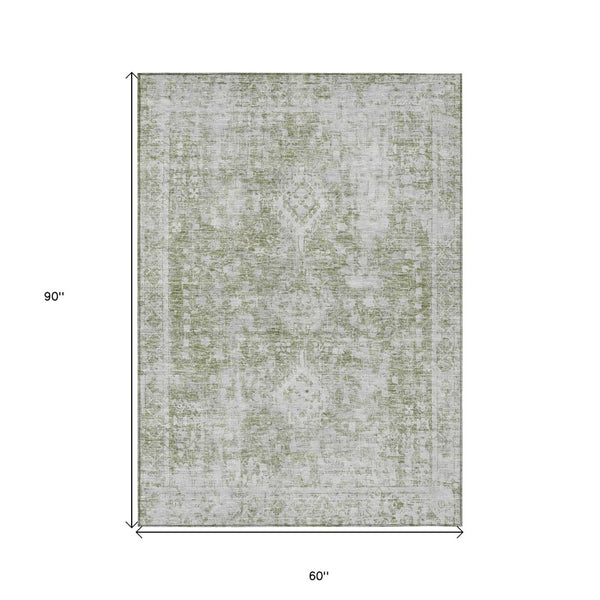 HomeRoots 5' Artichoke Green Oriental Area Rug - Stylish, Washable, Durable for Indoor & Outdoor Spaces 5' X 8' 607585