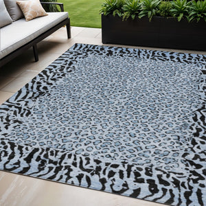 HomeRoots 5' Blue Animal Print Washable Area Rug - Stylish, Durable Accent for Indoor and Outdoor Spaces 5' X 8' 607639