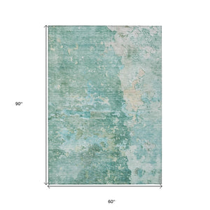 HomeRoots 5' Emerald Abstract Area Rug - Durable, Washable, Chic Design for Indoor and Outdoor Spaces 5' X 8' 607783